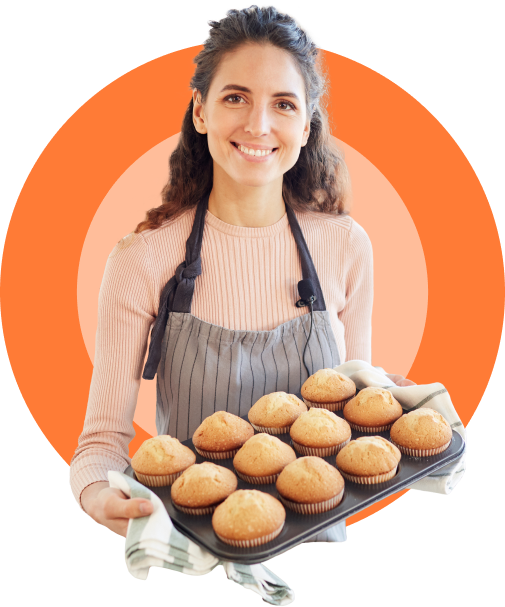 Women prepare homemade cupcakes for online orders.